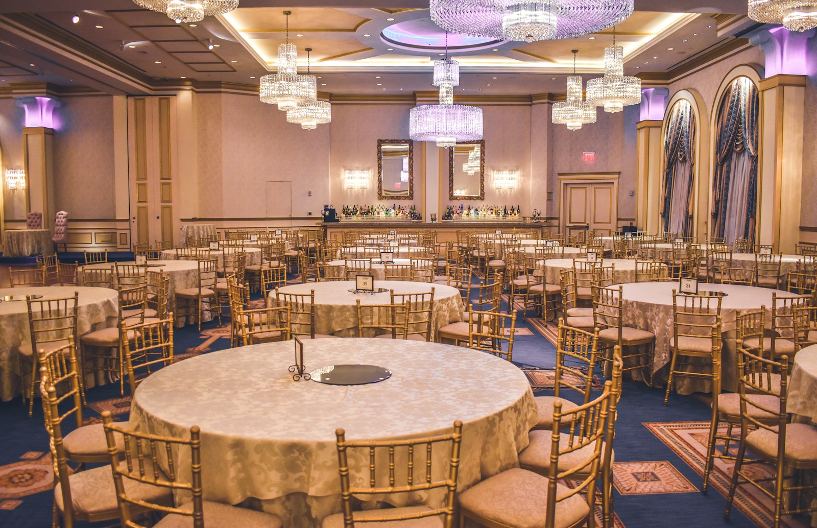 A reception hall fully set, ready to open its doors